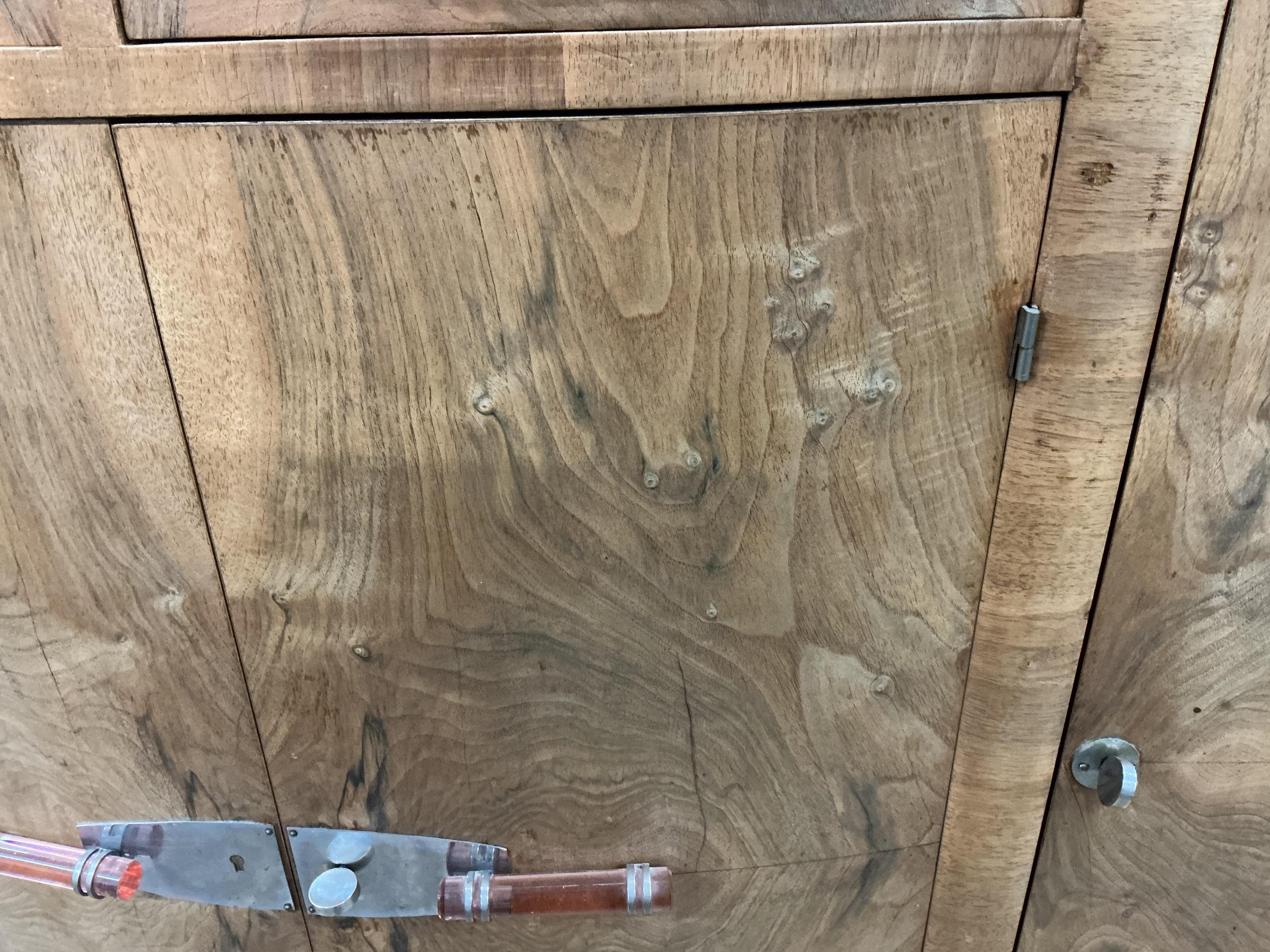 An Art Deco walnut marble topped bow front sideboard, width 158cm, depth 50cm, height 110cm